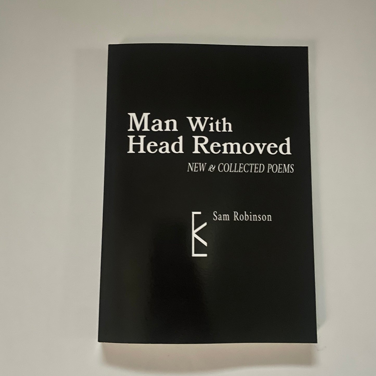 MAN WITH HEAD REMOVED: NEW AND SELECTED POEMS BY SAM ROBINSON